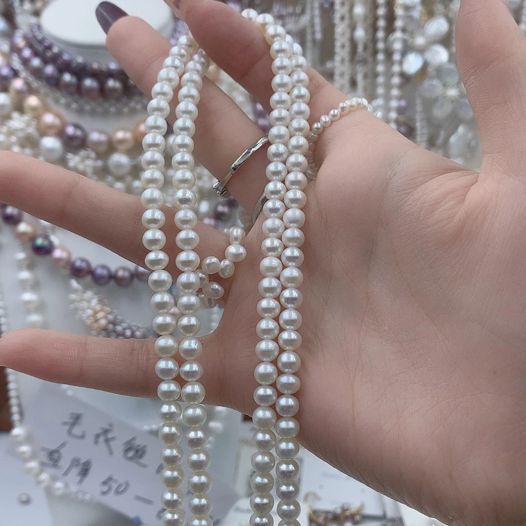 七***雪淡水珍珠耳饰银S925镶嵌