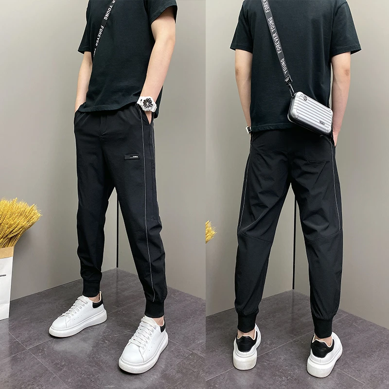 2025年夏季薄款潮流韩版痞帅束脚裤青年男士休闲黑色ins九分裤男