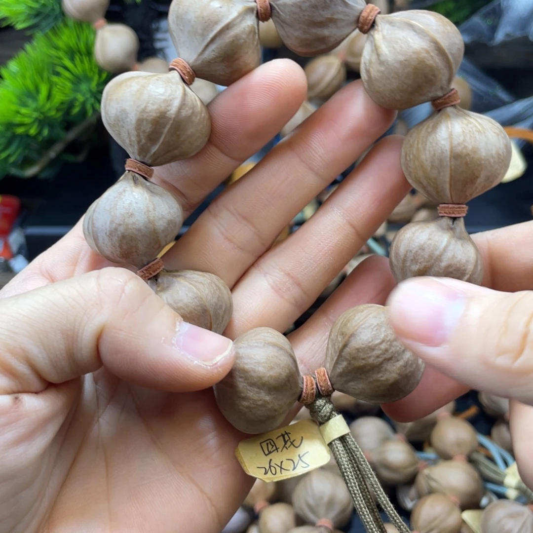我***蛋橄榄核吊坠2625四花铁核