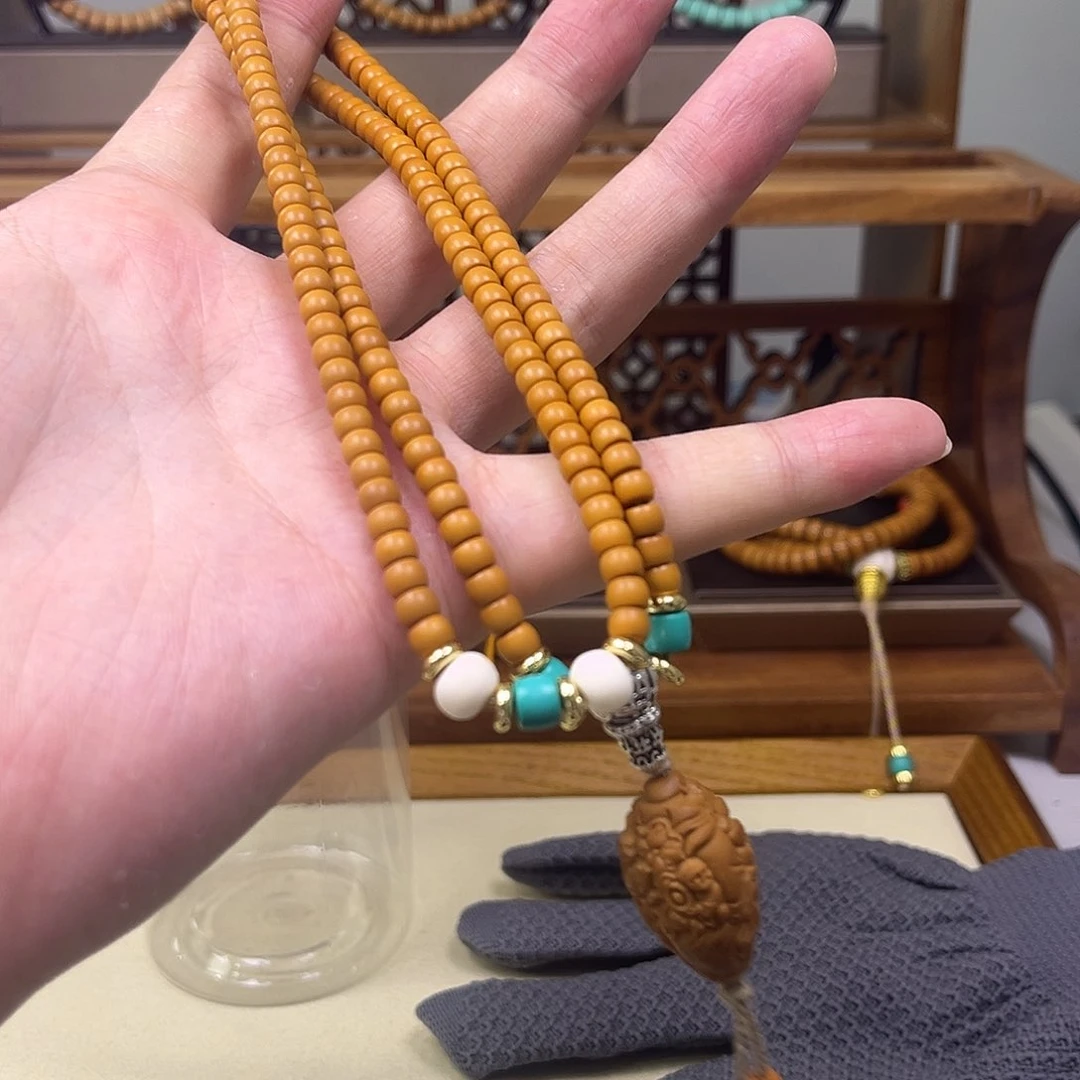 5.3清水橄榄核尖满配脖挂雕刻款