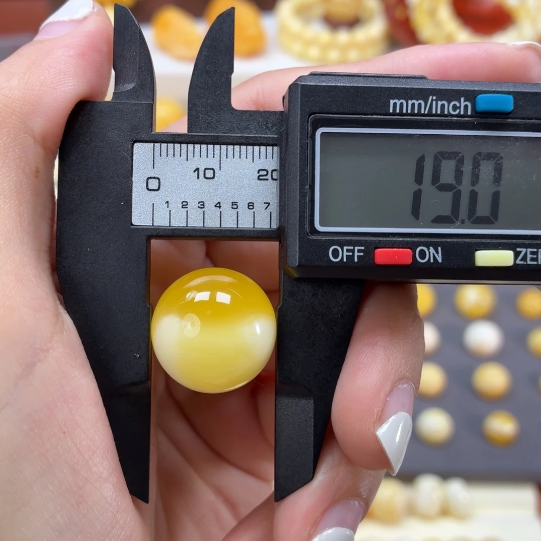 琥珀未镶嵌裸石焦皮橘金溶洞19mm