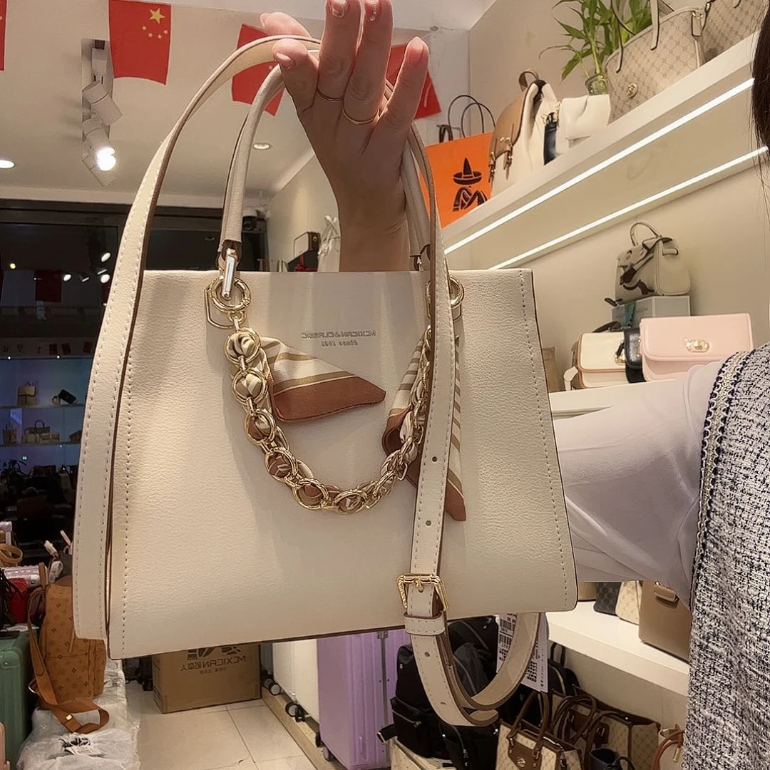 牛剖层皮革稻草人女包单肩手提包