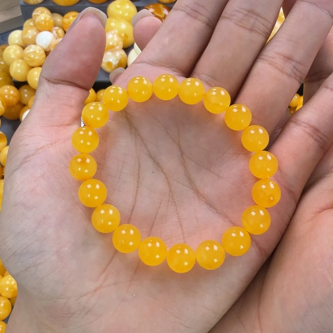 莫***名蜜蜡未镶嵌珠宝奇石