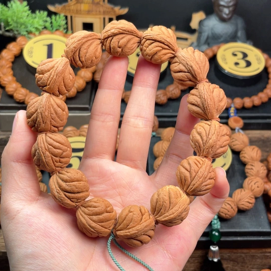 吊坠桃核霸王龙21编织绳