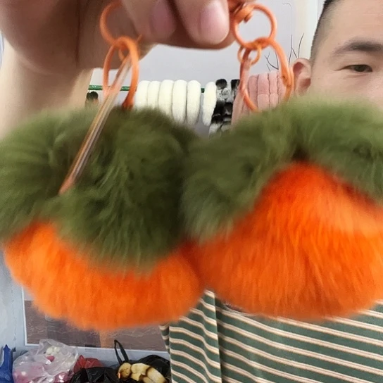 三醋酯纤维兔皮獭兔毛柿子