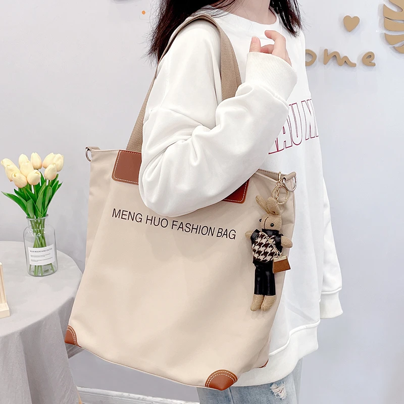 帆布包女斜挎单肩包2025新款学生上课手提布袋大容量上班通勤拉链