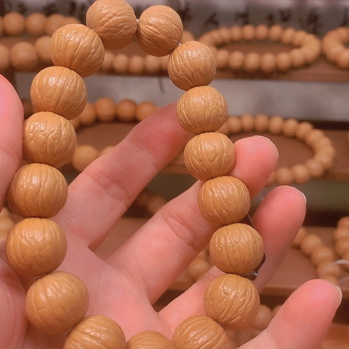 文玩核桃吊坠哈***1聚宝盆