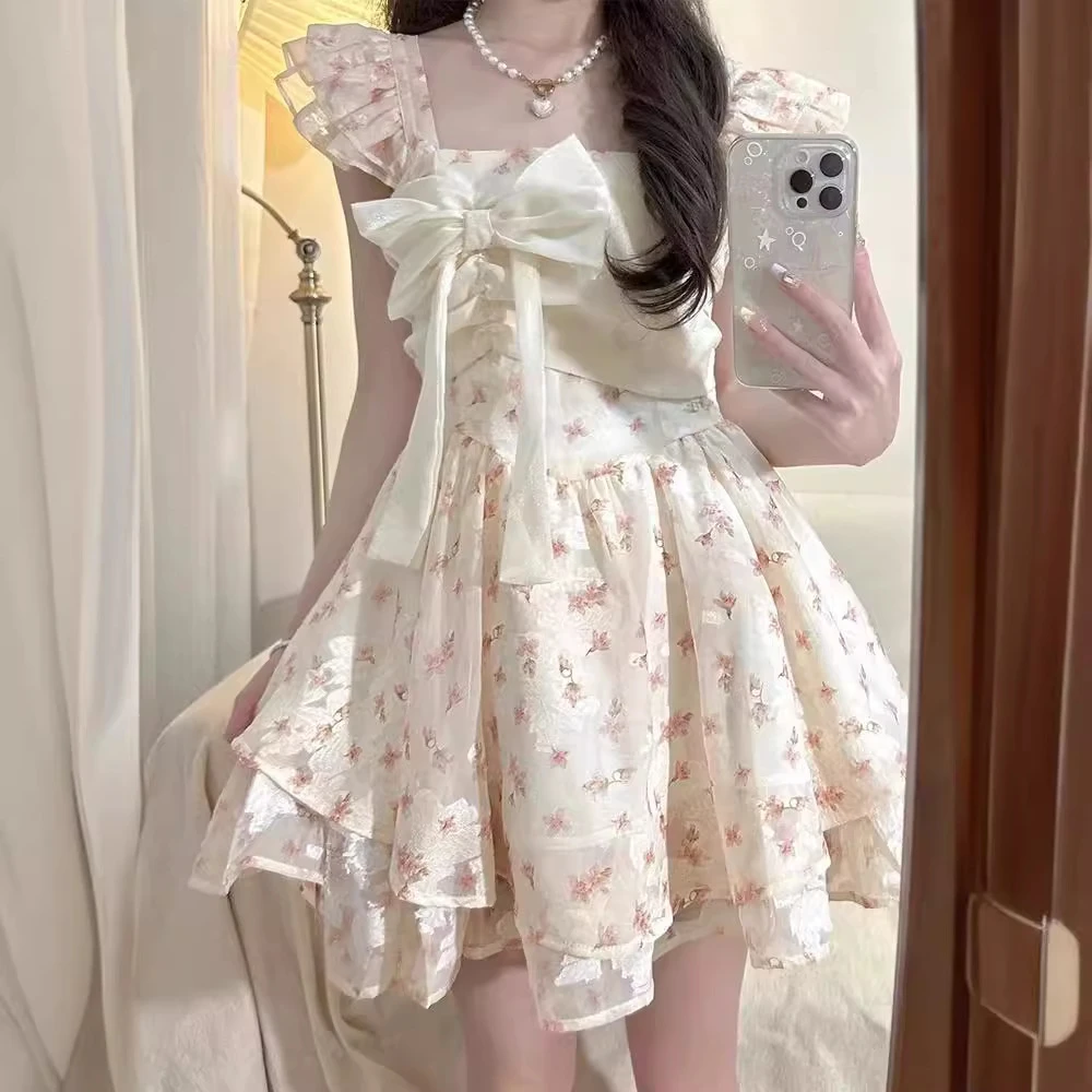 法式甜美纯欲风小飞袖结碎花小众连衣裙女小个子在逃公主蓬蓬裙夏