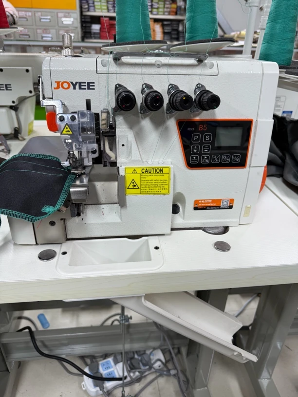 中屹555步进四线锁边机