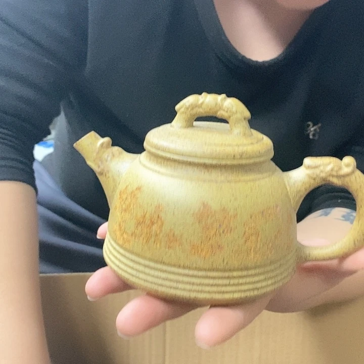 紫砂茶壶仍然让他柔软