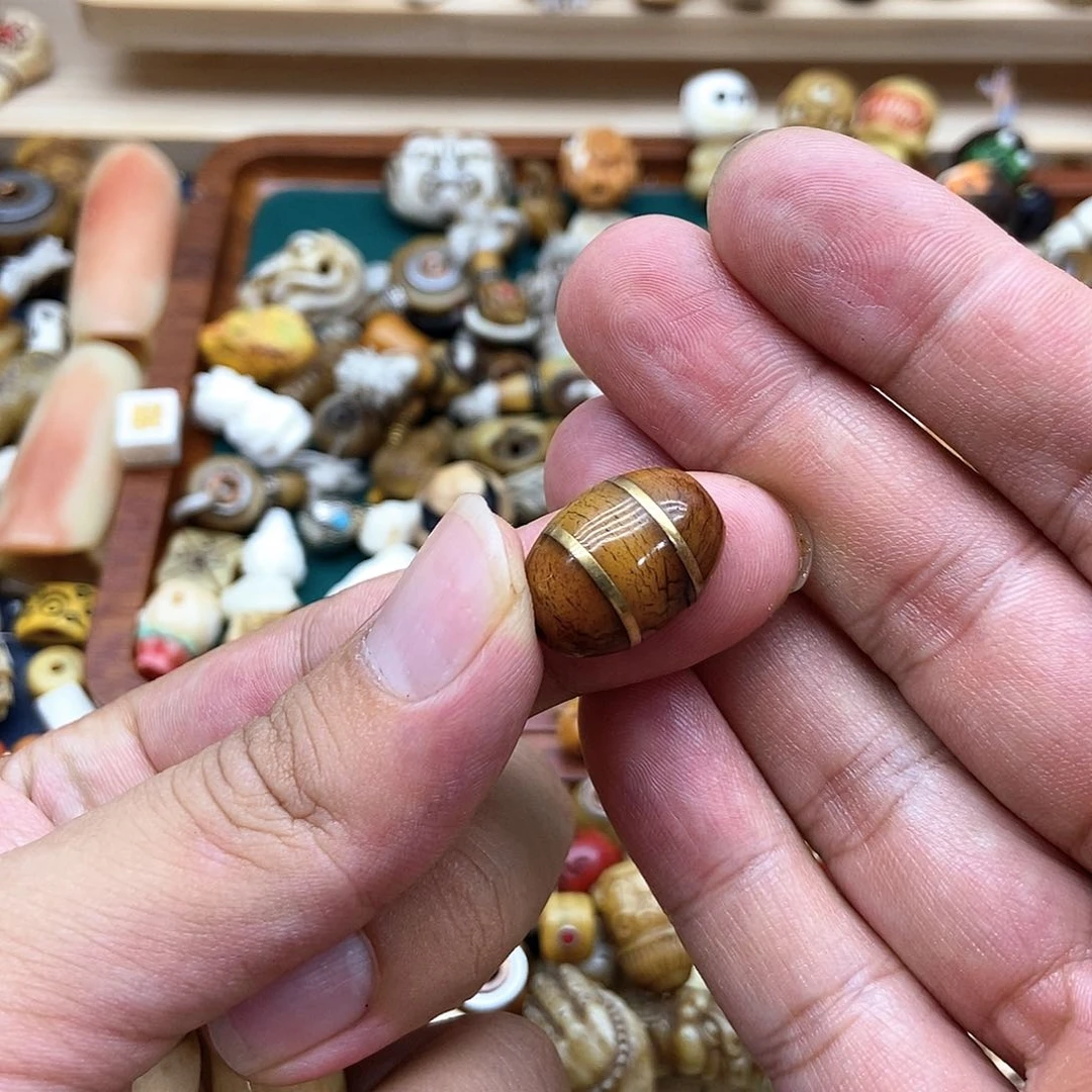 酒***深其他驼骨配饰搭配