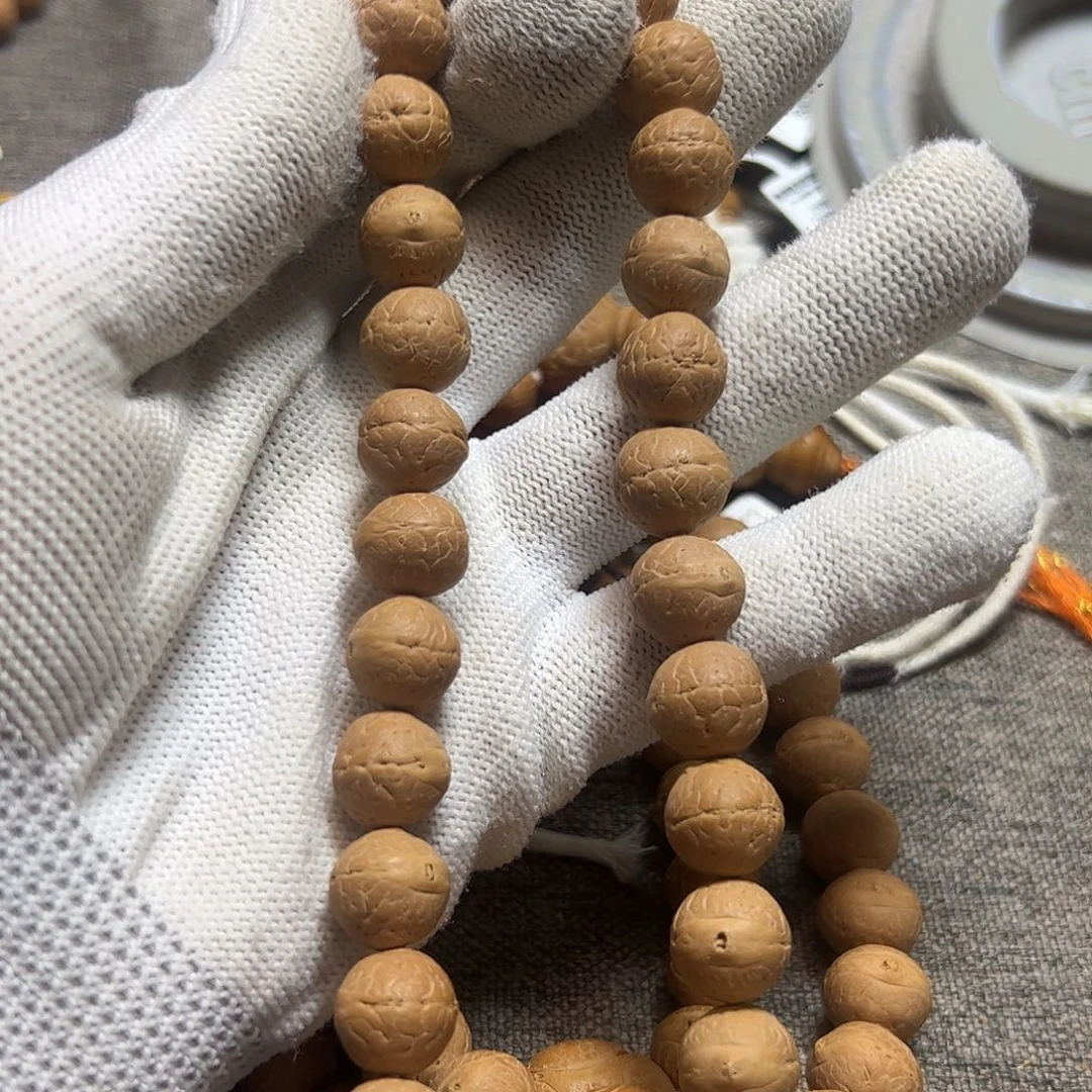 凤眼菩提吊坠11.5mm实心籽手持27颗
