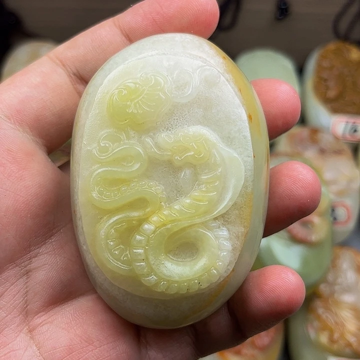 霏***吧石材方解石手把件