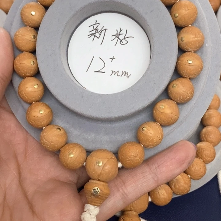 吊坠凤眼菩提铜手串
