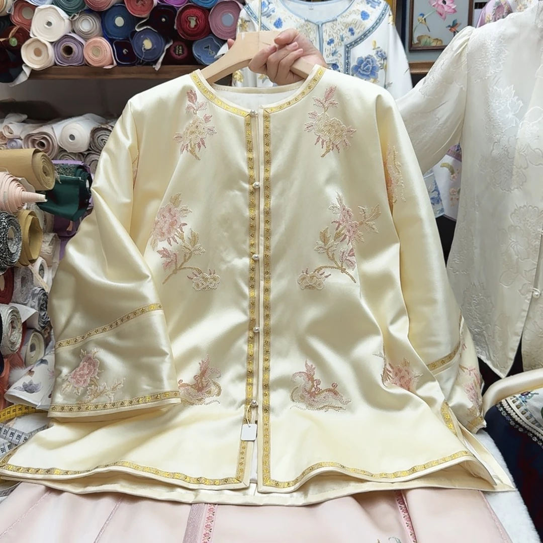 苏绣棉服3.胸围112.衣长67