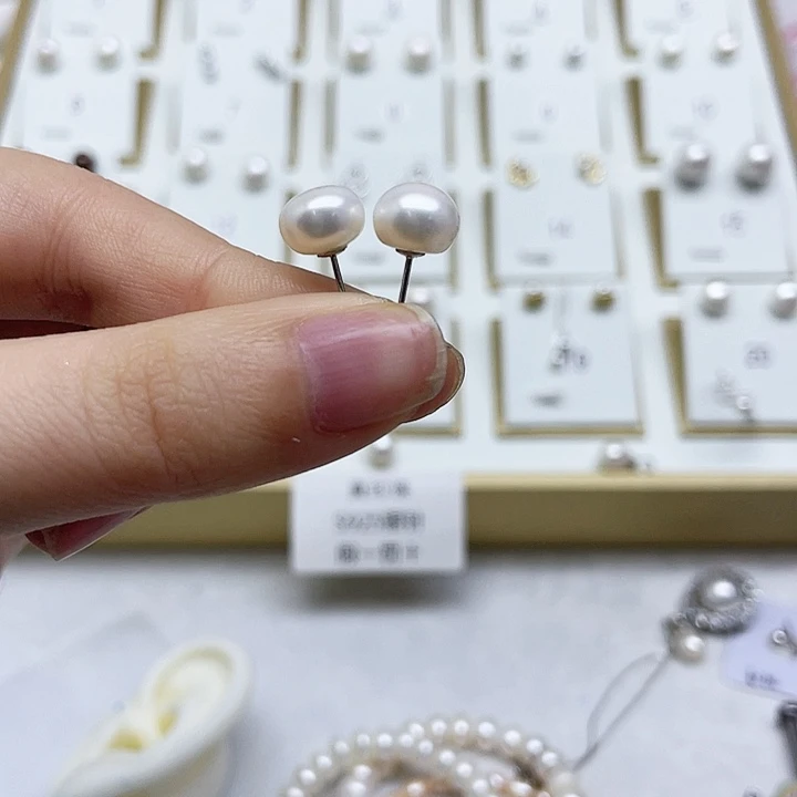 淡水珍珠耳饰银S925镶嵌棒**?