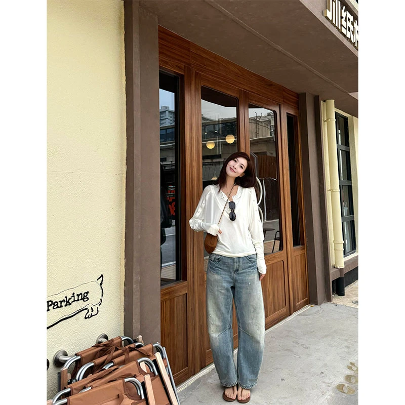 韩系夏季2025设计感洋气纽扣长袖上衣休闲百搭高腰直筒裤牛仔裤女