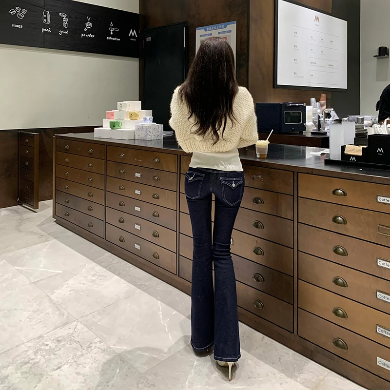 Liuu嘻嘻阿韩版自带丰胯喇叭裤女初冬季节翻盖口袋设计修身牛仔裤