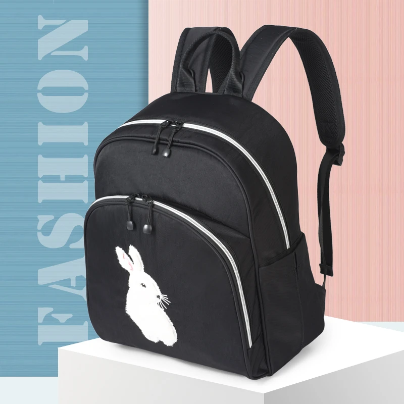 双肩包女旅游新疆发货大学生拉链双肩包女耐磨初中生轻便