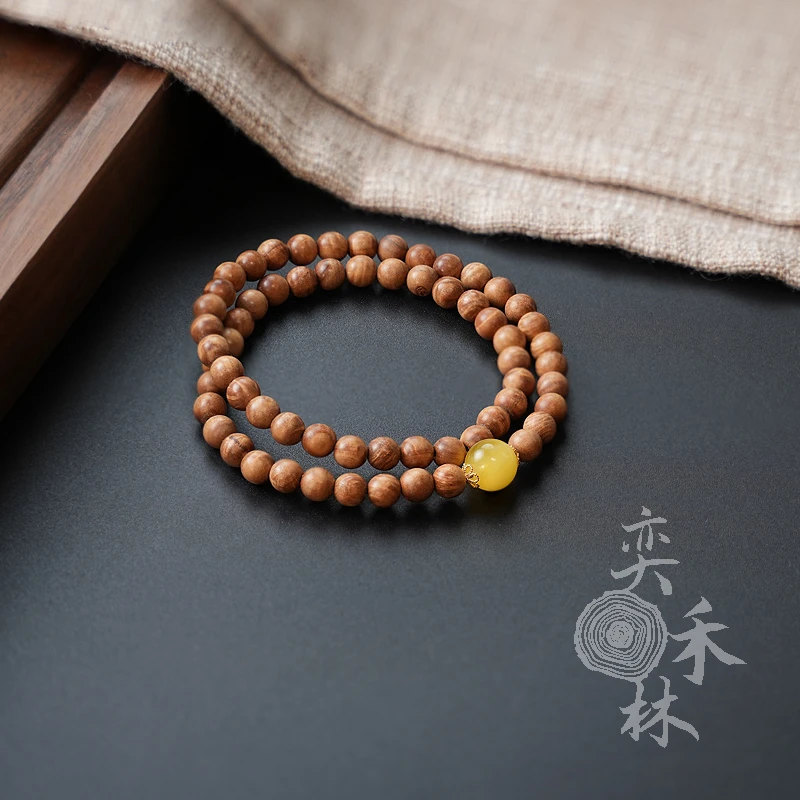 奕禾林 老山檀水波纹蜜蜡双圈手串