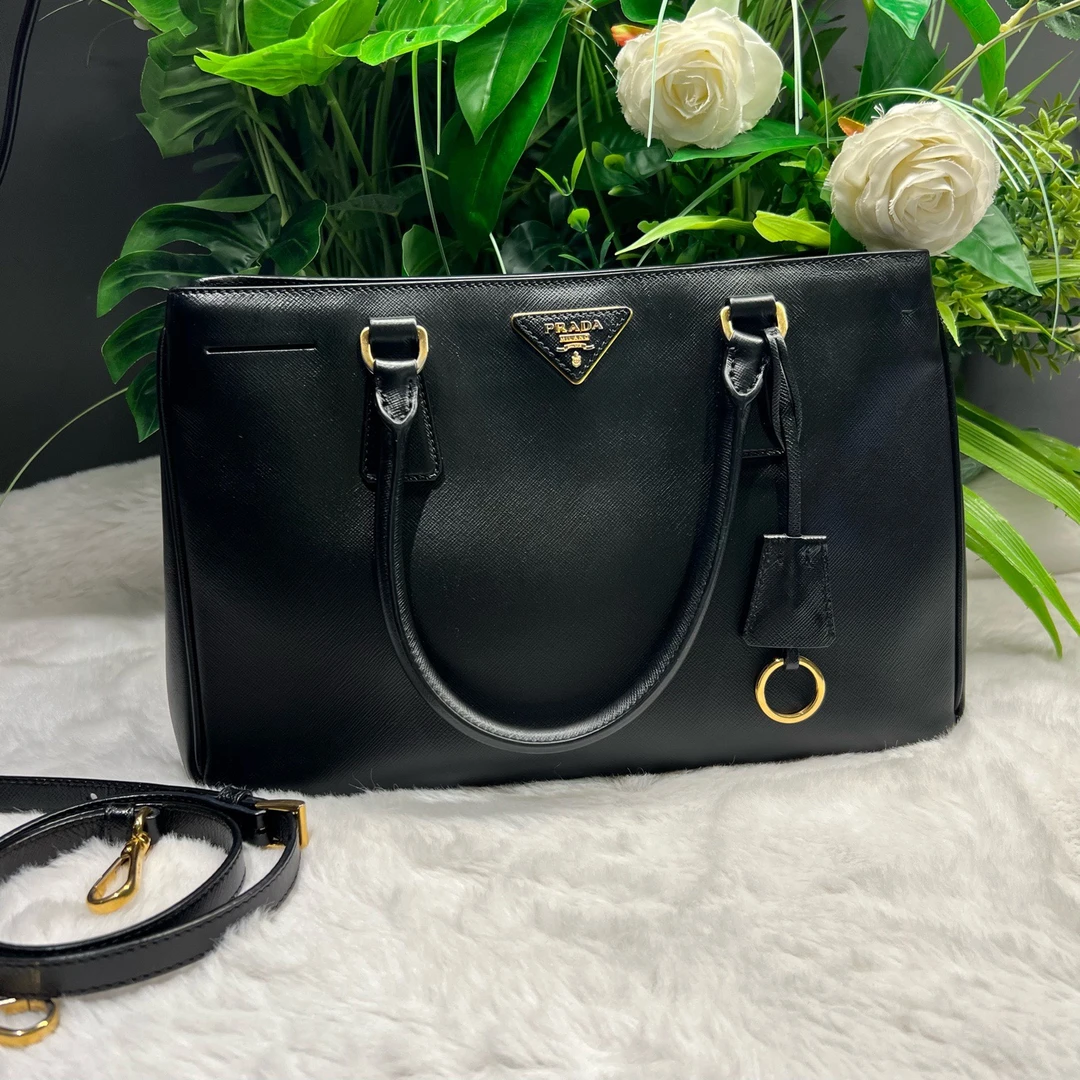 99新 Prada/普拉达  十字纹牛皮黑杀手包斜挎包80171