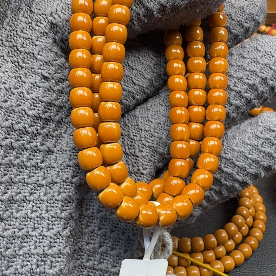 郑***)橄榄核手串/手链6.6老挝正三花核尖108微白