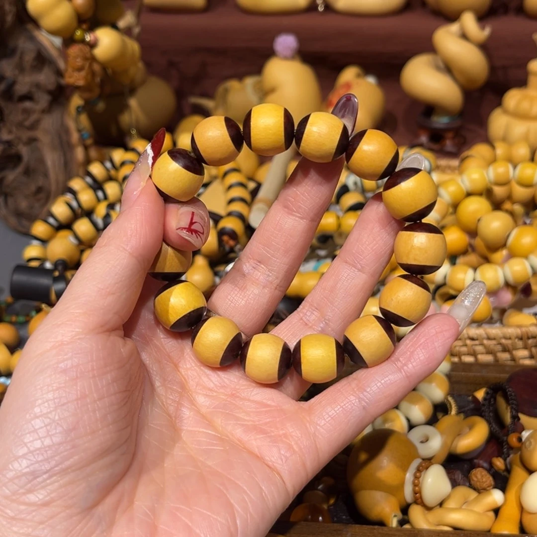 知****乐紫檀手工手串带铜管15颗