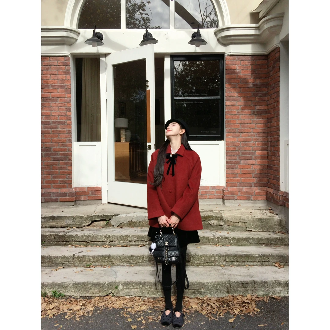 【绯红特调】76909 含羊毛千金风甜美蝴蝶结斗篷衣翻领宽松毛呢外套