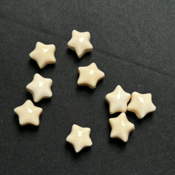 PD093 星星 只做天然猛犸牙 约长度11*厚度9mm