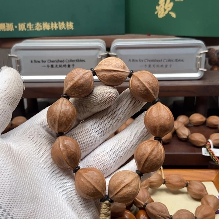 卖***黄手串橄榄核2027三花