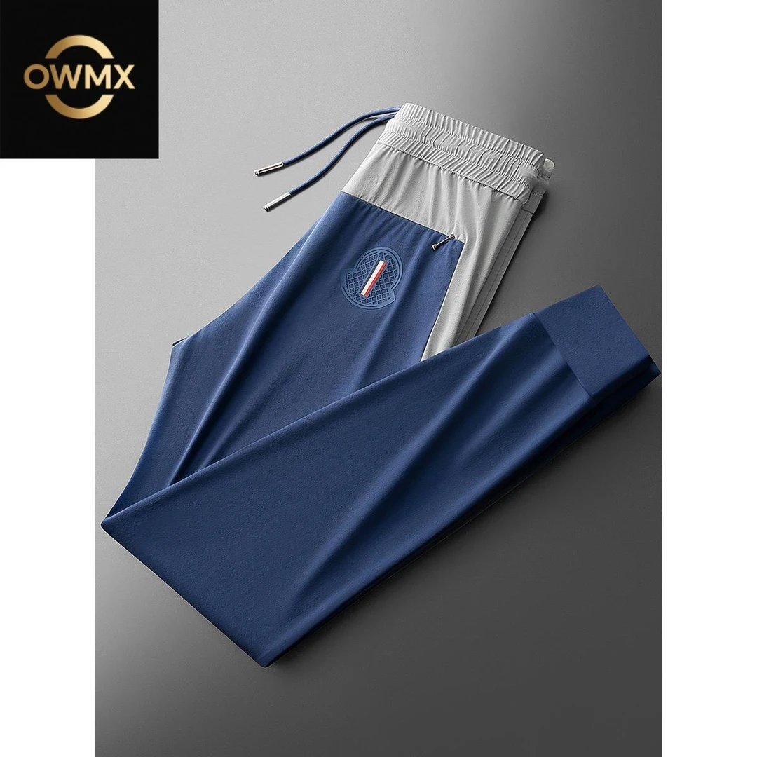 夏季时尚潮流冰丝抗皱速干休闲裤男士撞色拼接运动小脚牛奶丝卫裤