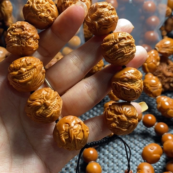 橄榄核吊坠销**迹向死而生