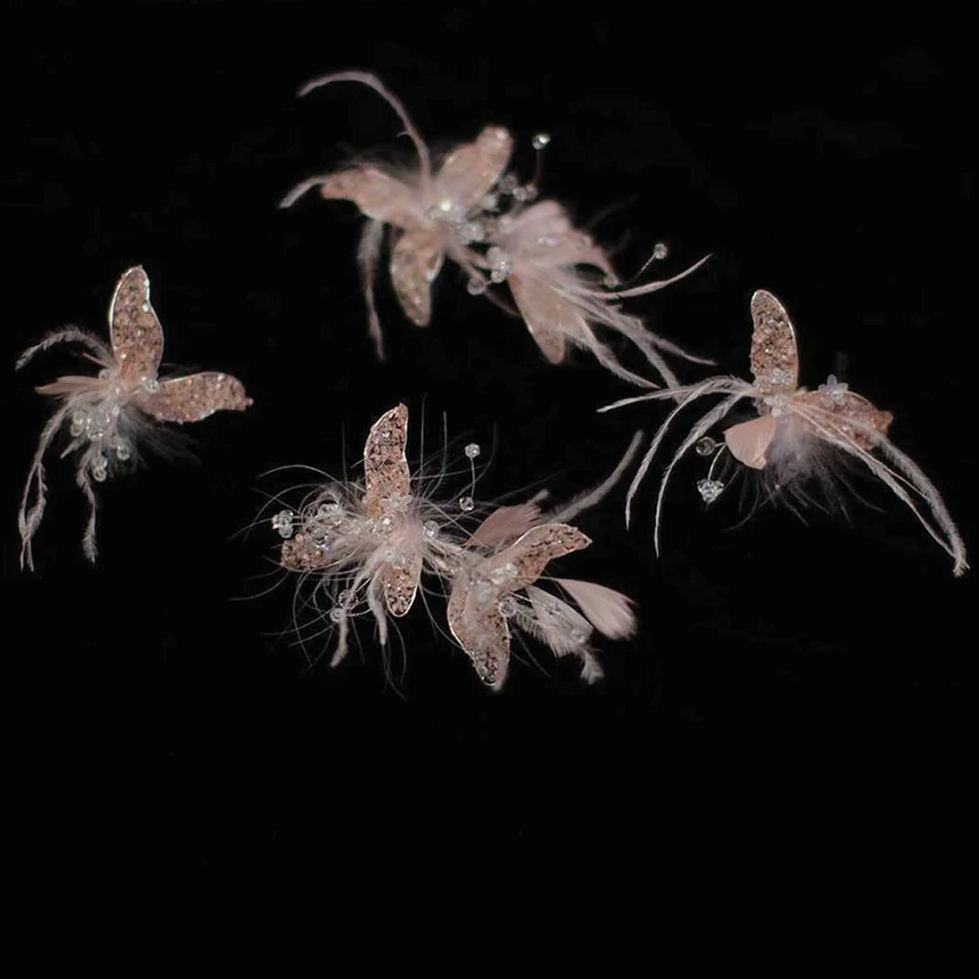 新款粉色仙气羽毛花朵蝴蝶结飘带对夹婚纱新娘礼服在逃公主头饰