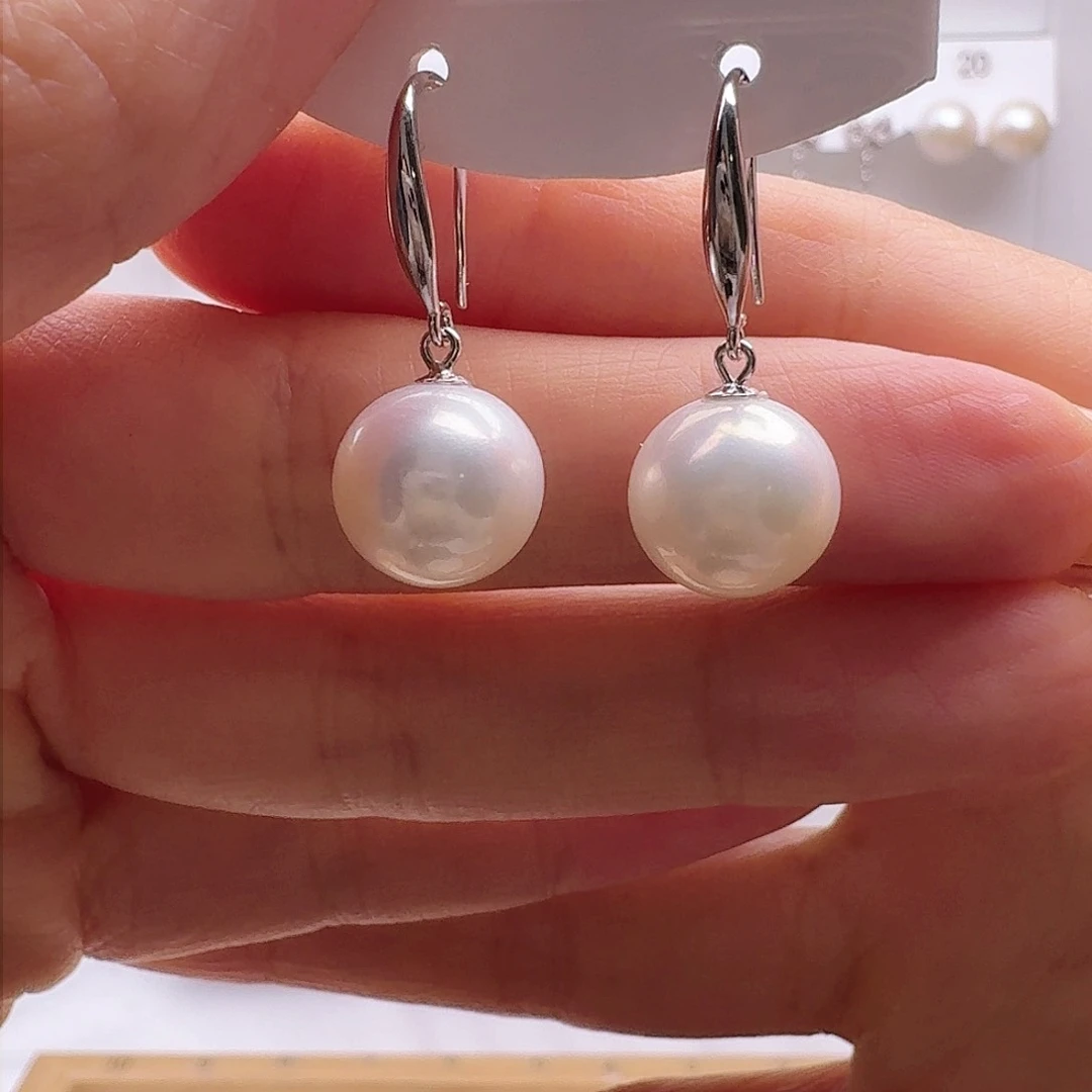 淡水珍珠耳饰银S925镶嵌大*。