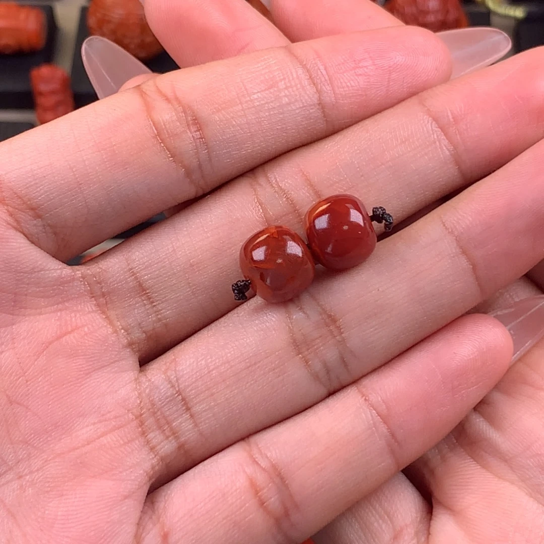 紫***焱未镶嵌火焰纹老型对珠10mm南红玛瑙