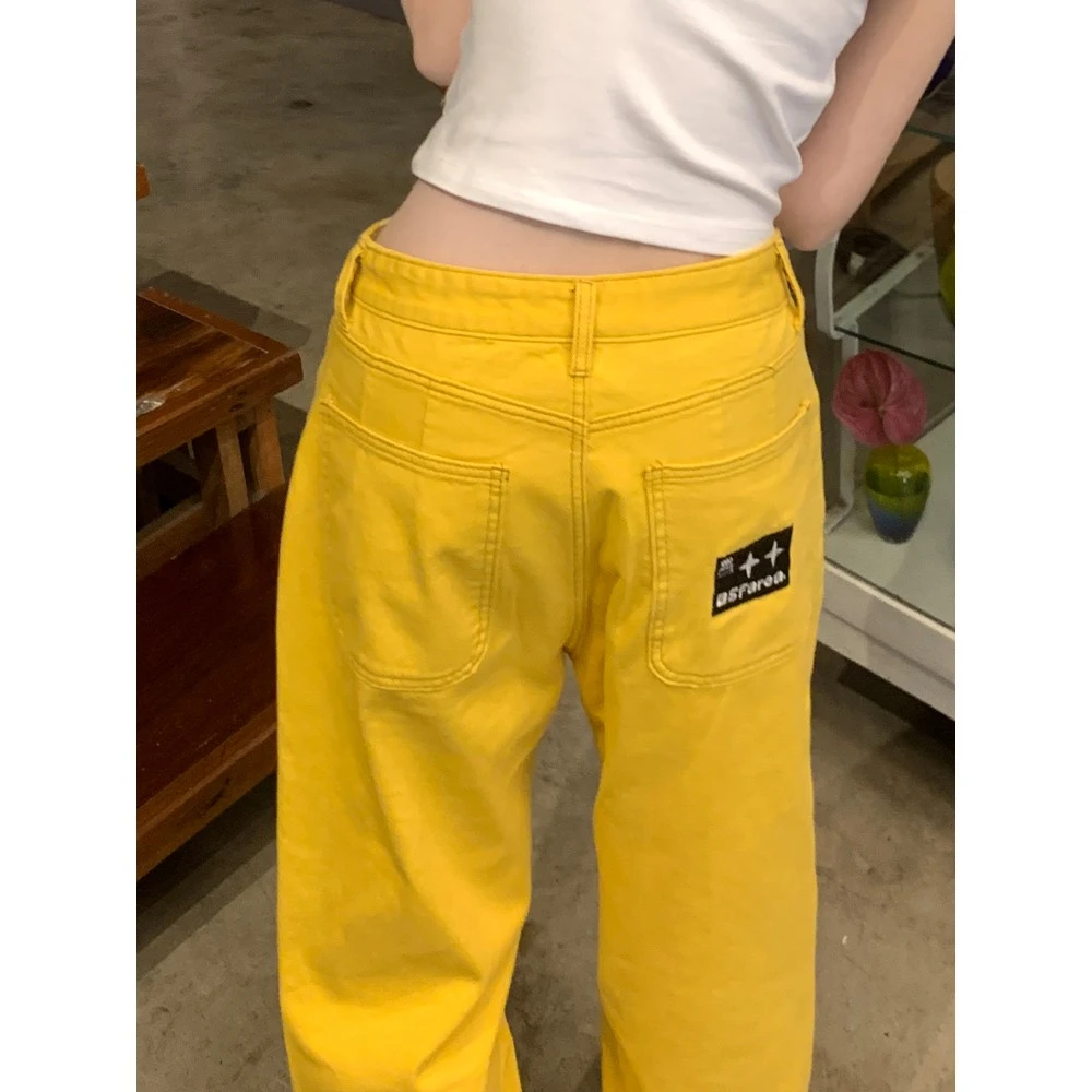 夏季和秋季设计彩色刺绣牛仔裤女士夏季美国窄直腿宽腿黄裤