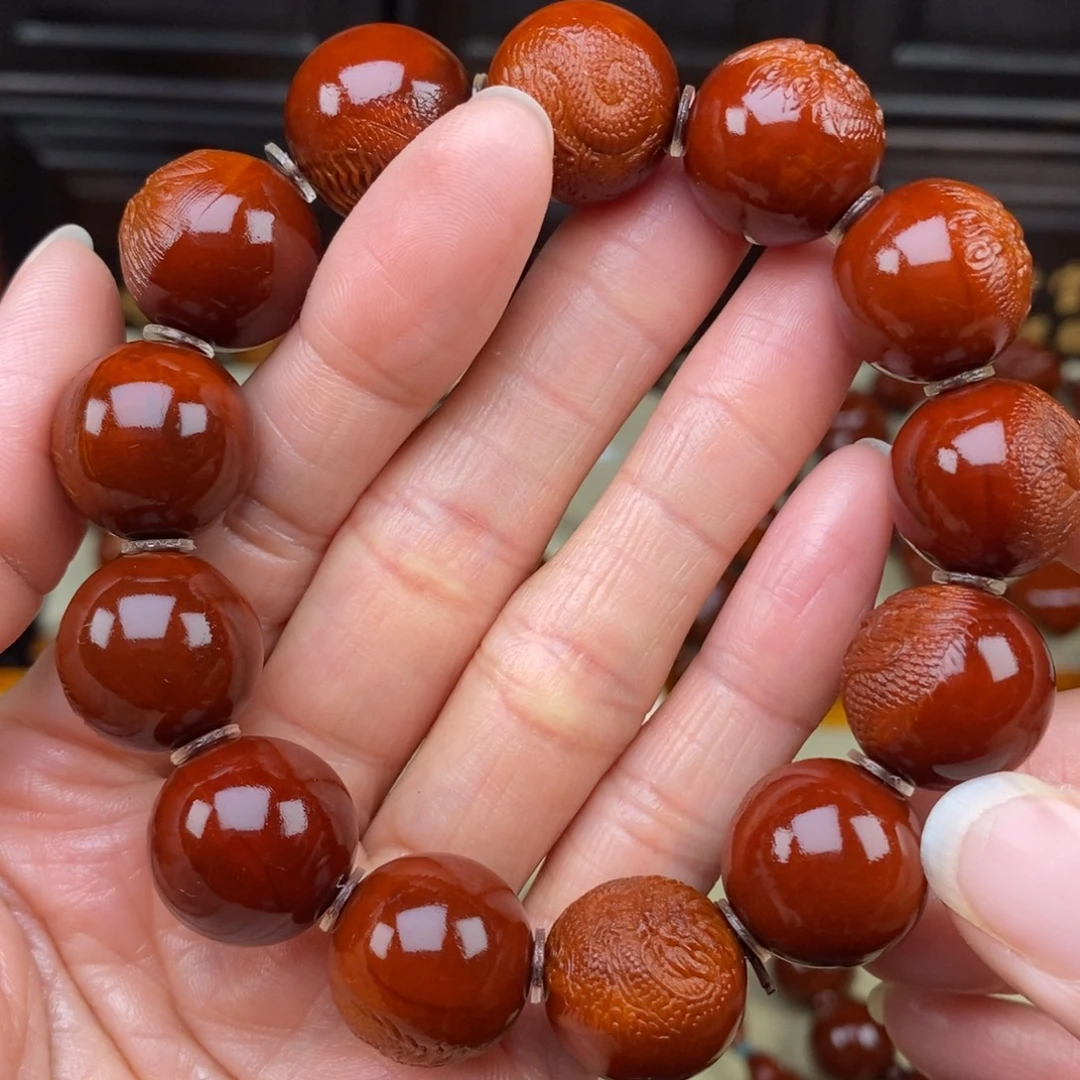 哈***）橄榄核吊坠浮雕龙