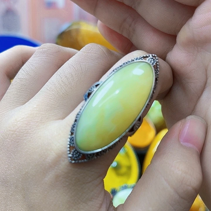 坤***灵琥珀银S925镶嵌颈饰戒指