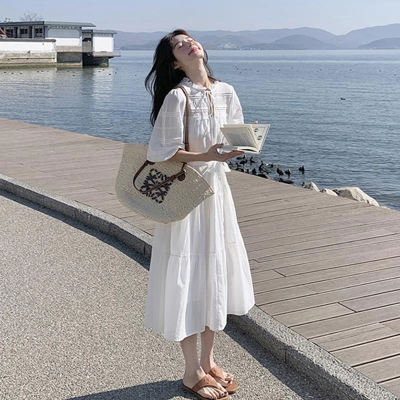 白色泡泡袖连衣裙女夏季2025新款温柔独特漂亮度假风法式长裙