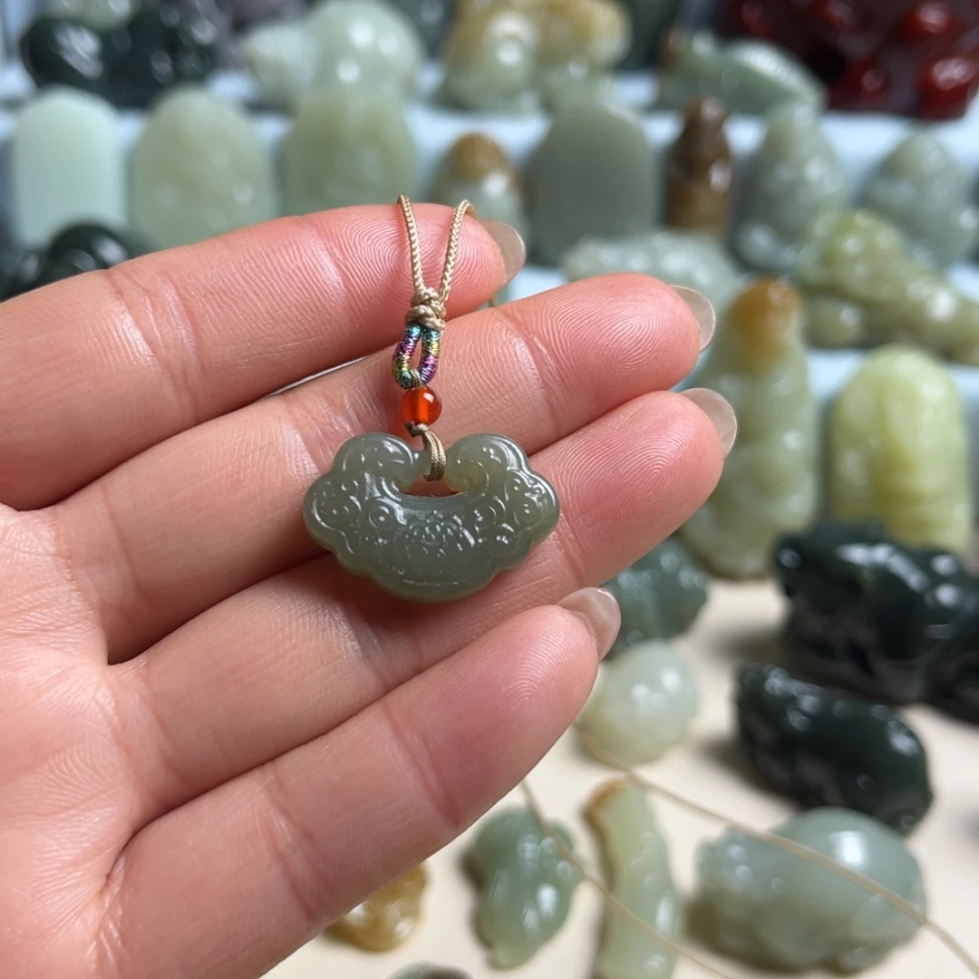 廖***明和田玉未镶嵌把件
