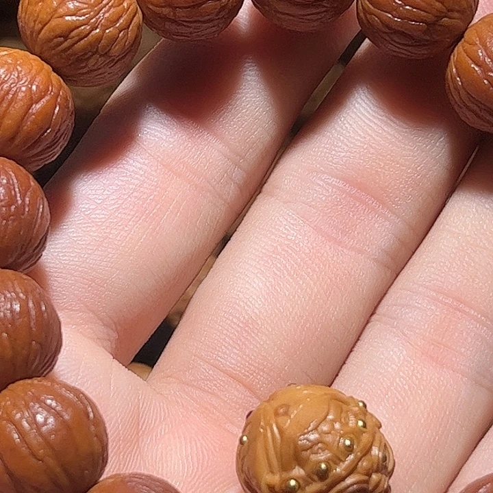 叫***_吊坠猴头核桃15同尺凤羽全品无瑕加扎吉