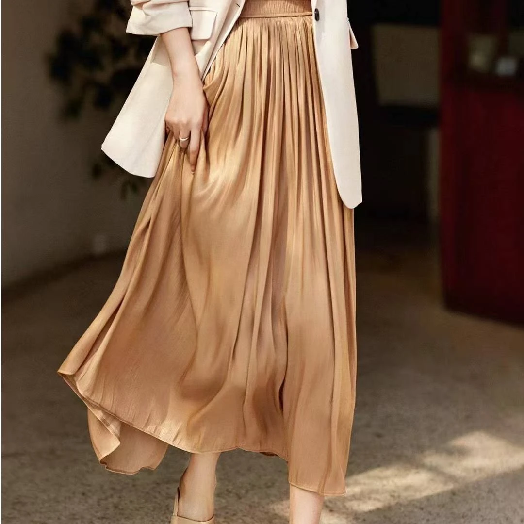 【休闲通勤裙】2025牛奶光裙女显瘦百褶半身裙珠光感A字裙