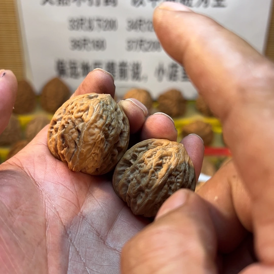 六***七吊坠文玩核桃铁锤