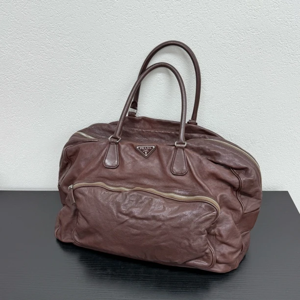 95新 Prada/普拉达 【圣诞价】牛血棕机场保龄球单肩包 118645