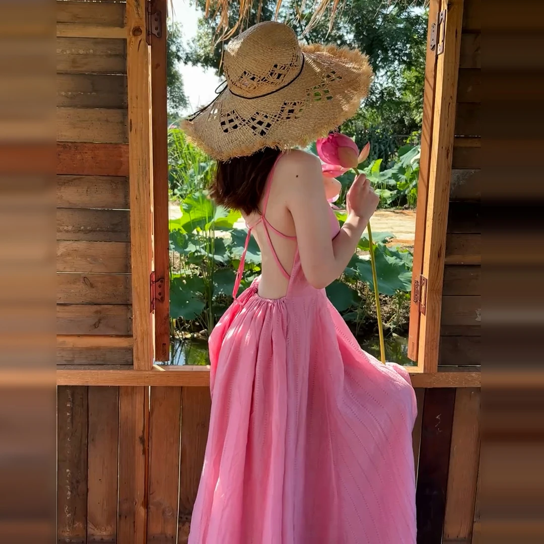 法式海边度假粉色吊带连衣裙子女夏季2025多巴胺露背沙滩长裙4696
