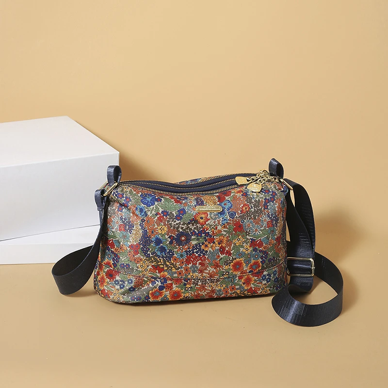 新款大容量尼龙帆布包百搭时尚碎花女包妈妈包牛津布斜挎包单肩包