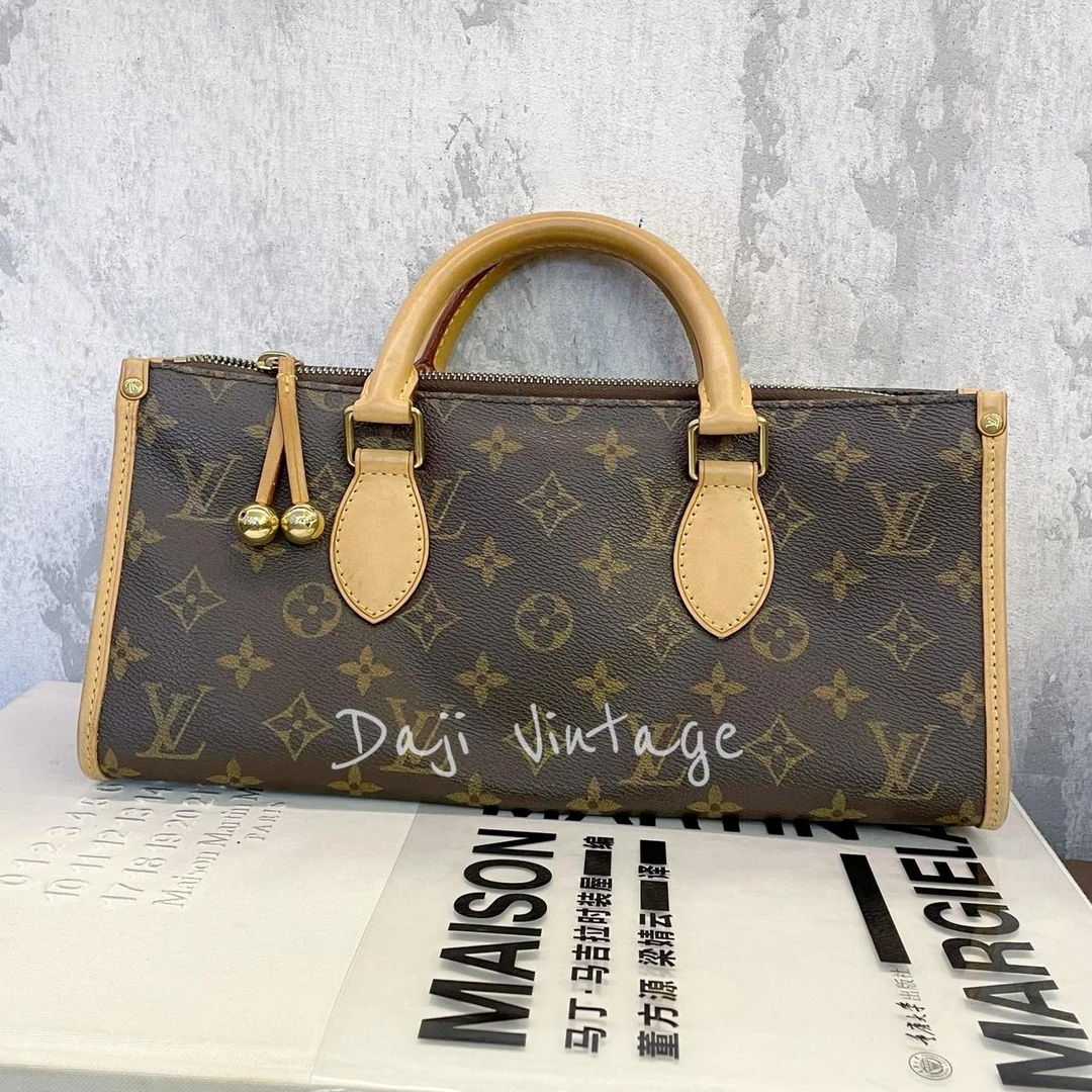 大吉中古/Lv老花金球三角手提包