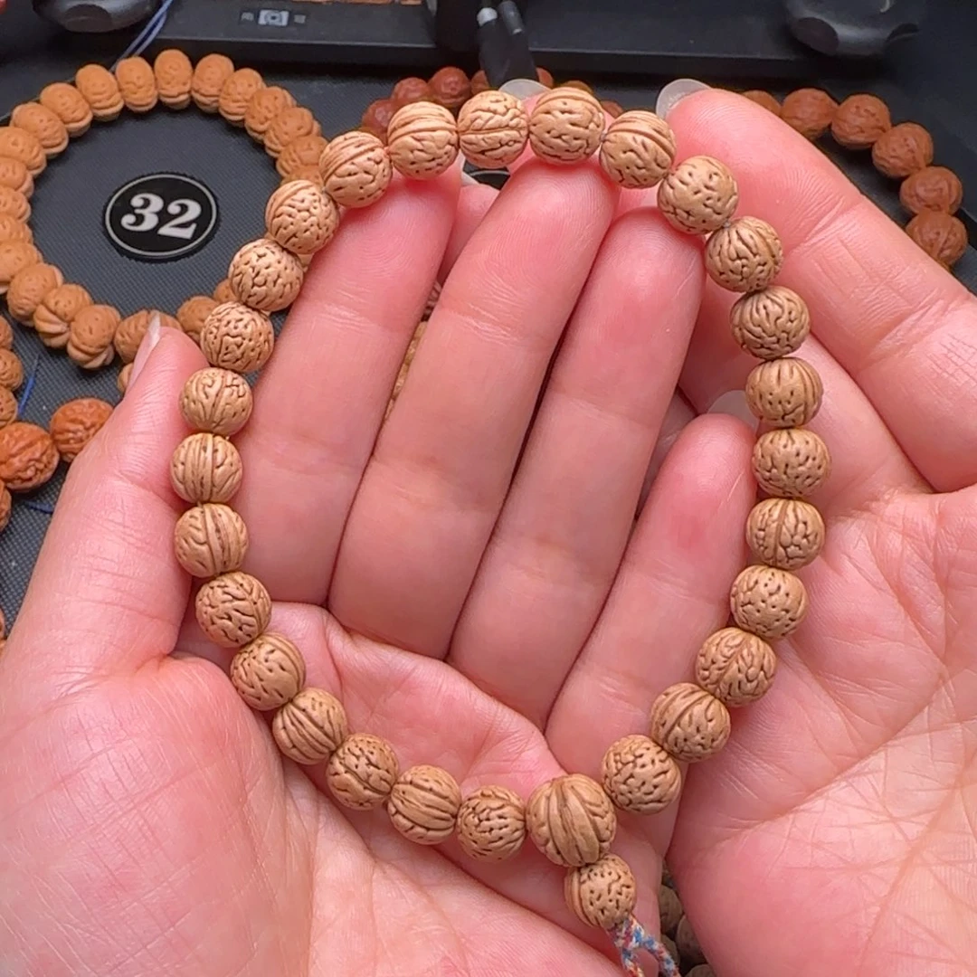 多***、桃核手串龙珠桃核手持