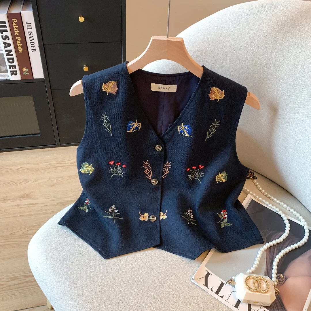 十三行2025夏季V领排扣无袖宽松刺绣藏蓝色不规则背心马甲上衣女
