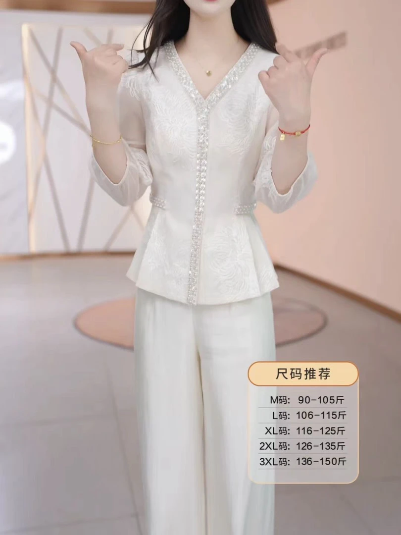 高端气质时尚刺绣套装2025春季新款设计感显瘦遮肉减龄两件套裤子